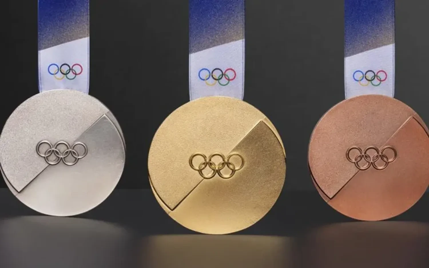 2026 Olympic medals were cracking due to a safety mechanism — the organizing committee fixed the problem